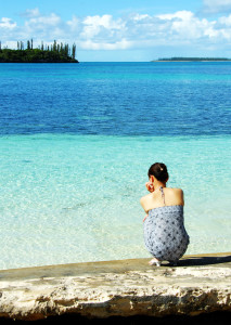 woman thinking by water